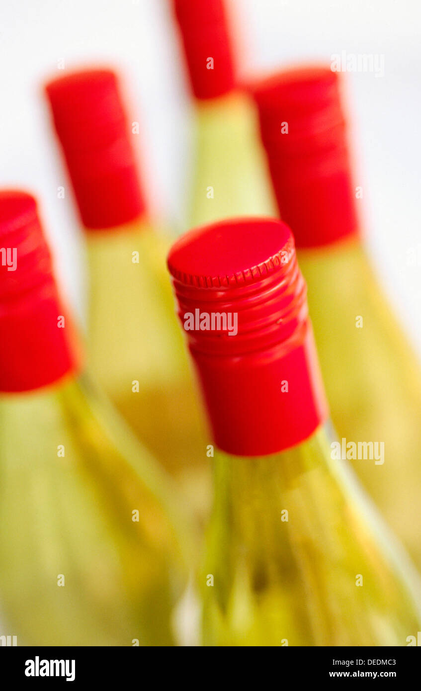Red screw cap wine bottles Stock Photo