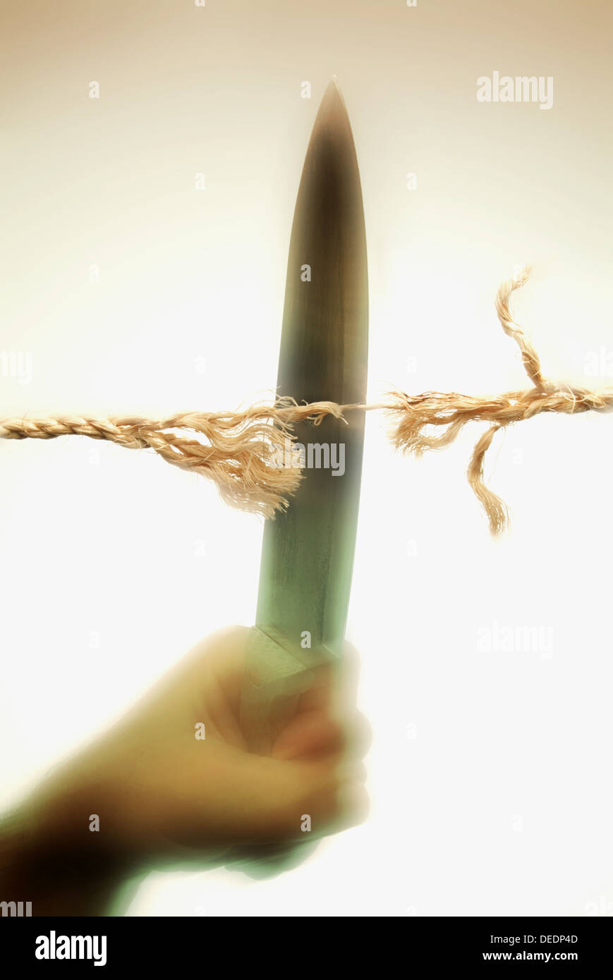 Knife cutting rope Stock Photo Alamy