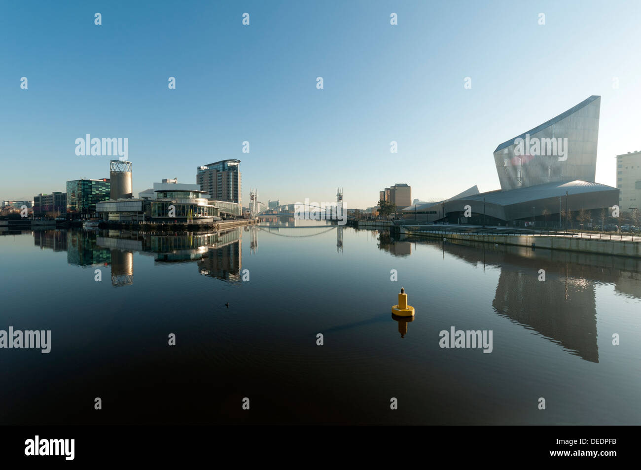 The Lowry and Imperial War Museum North reflected in the Manchester ...