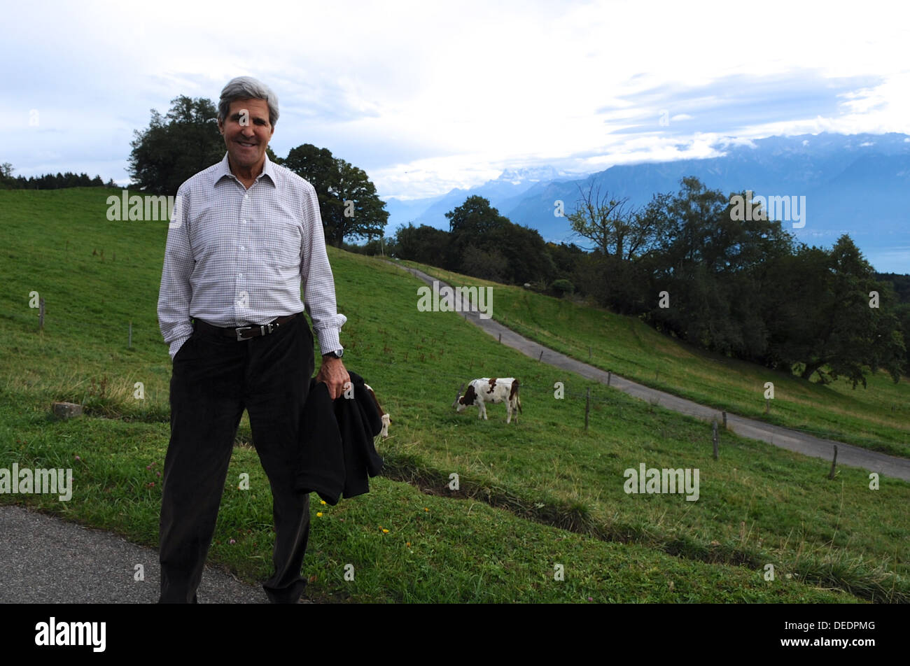 Secretary Kerry Pauses During a Walk in the Swiss Mountains Stock Photo