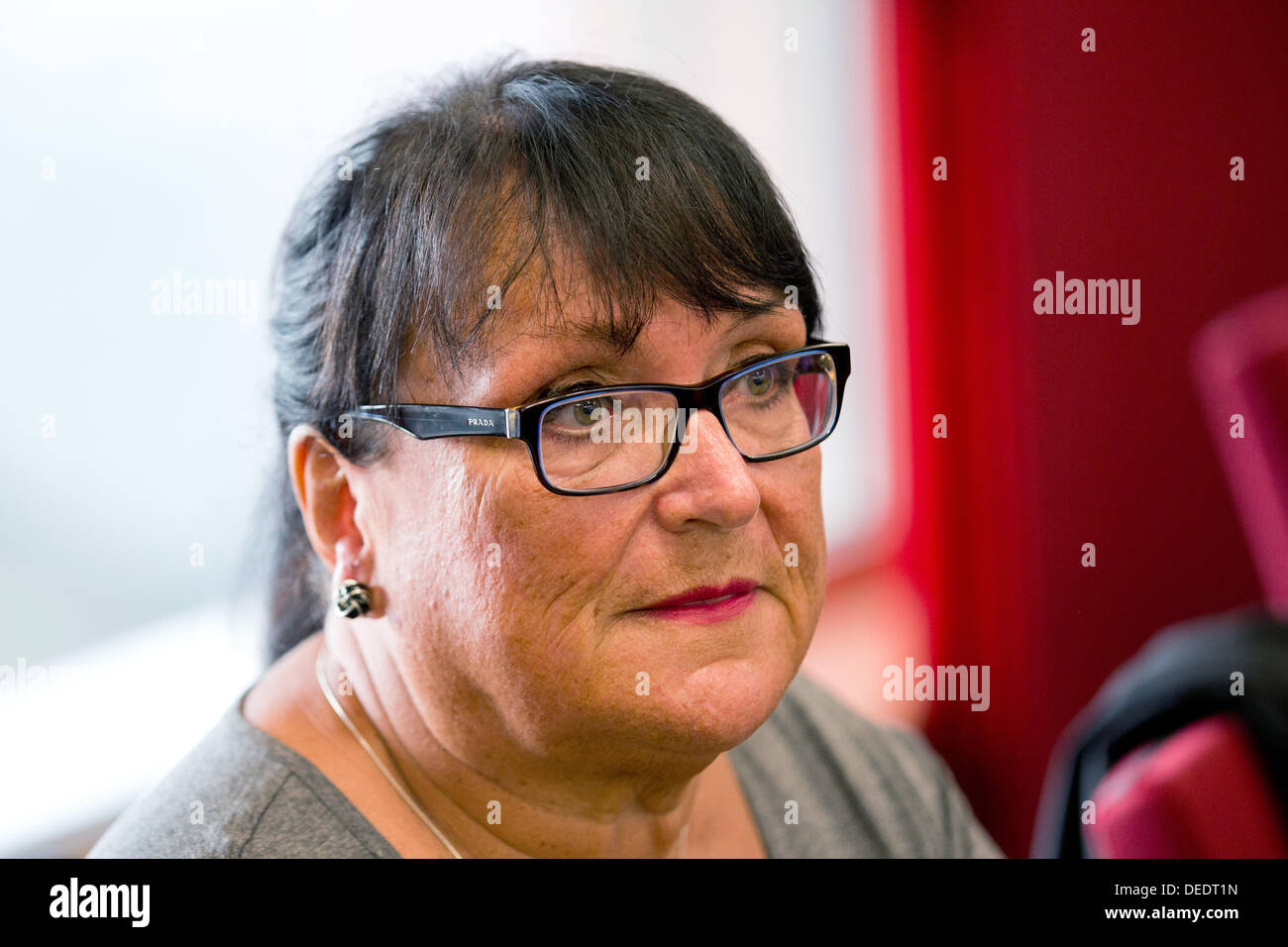 Duesseldorf, Germany. 17th Sep, 2013. Inge Meuter, mother of the murder victim and joint plaitiff, sits in a court room of the district court in Duesseldorf, Germany, 17 September 2013. Nine years after the murder of a young woman in Duessldorf the case has now gone to court. A 39 year old father of a family stands accused of the murder. Photo: ROLF VENNENBERND/dpa/Alamy Live News Stock Photo