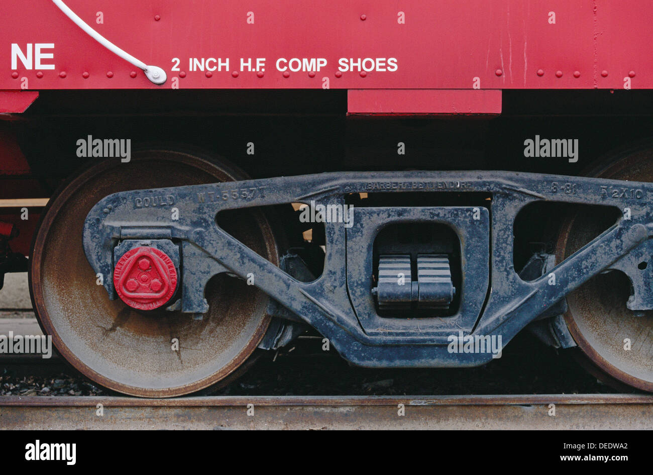 Red railroad car, track and wheel Stock Photo Alamy