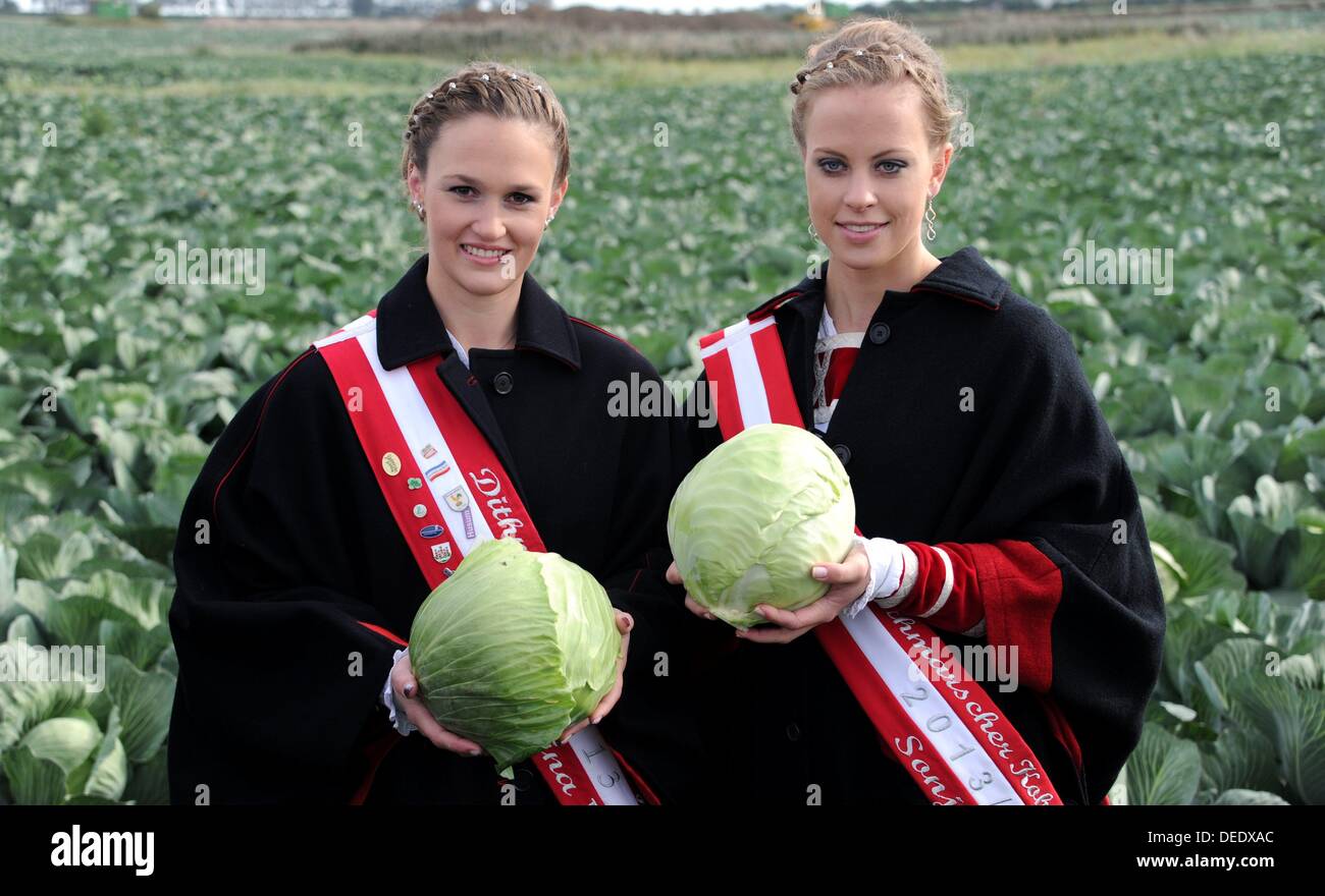 Cabbage regents Katharina I (L) and Sonja II pose with heads of cabbage