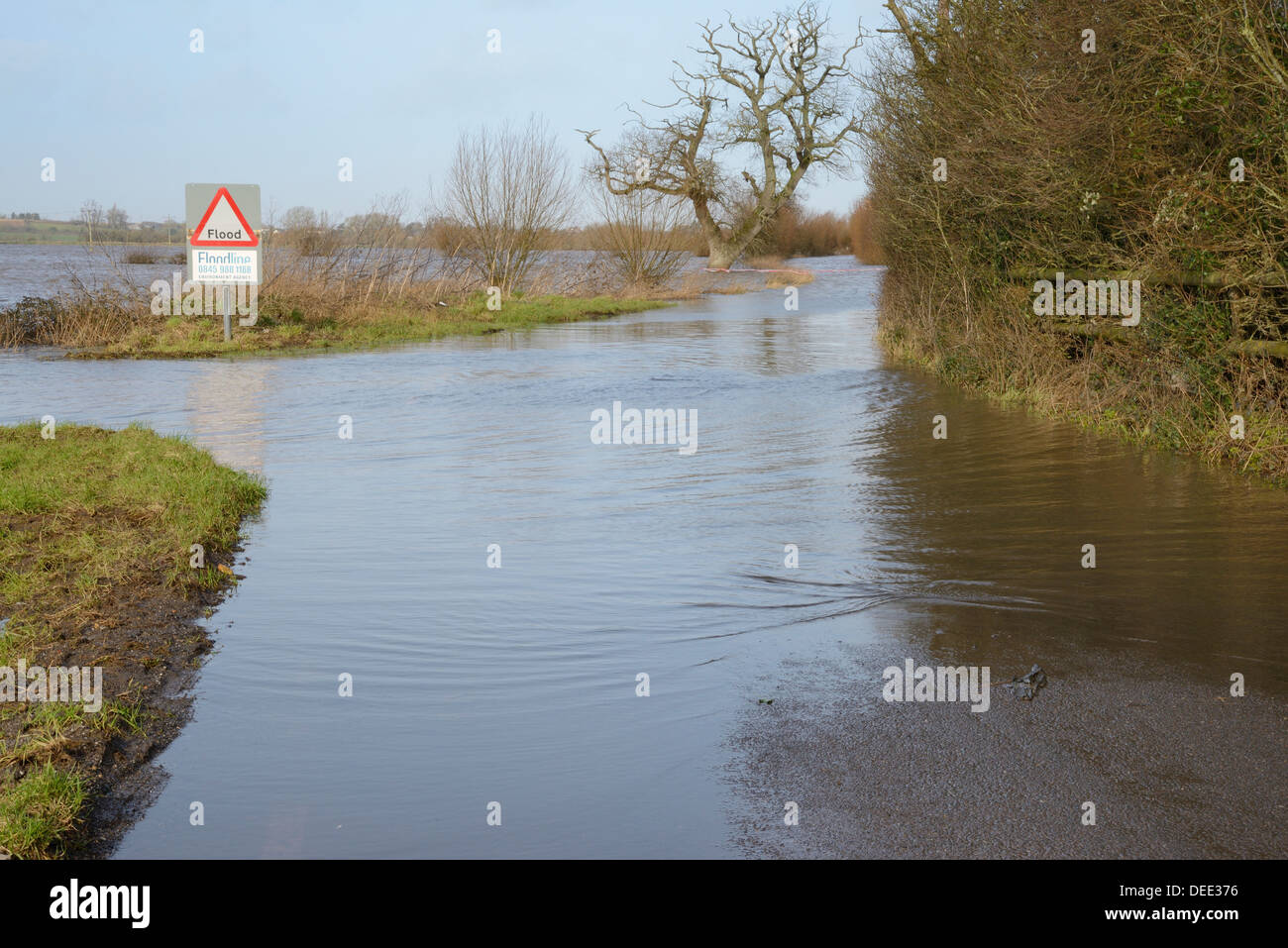 Severely flooded and closed road on Curry Moor between North Curry and East Lyng, Somerset, England, UK Stock Photo