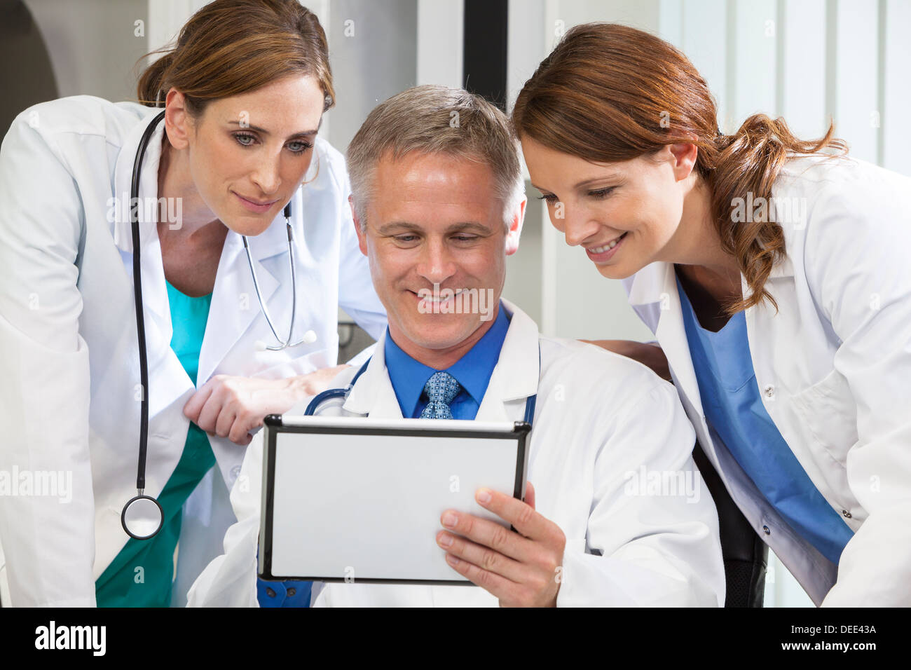 Medical team in coat hi-res stock photography and images - Alamy