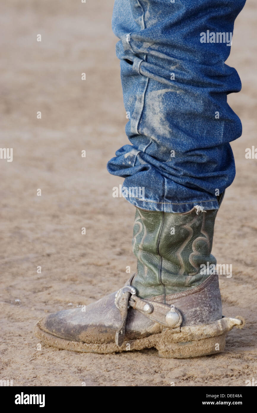 Muddy cowboy boots at rodeo. Tucson. Arizona. USA Stock Photo Alamy