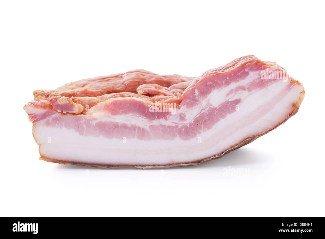 Smoked Bacon Slab Cut over white background, Shallow Focus, Horizontal shot Stock Photo