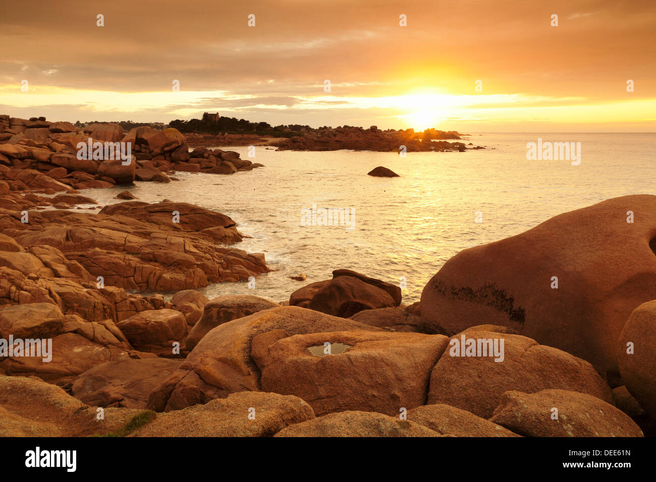 Rocks at the path Sentier des Douaniers on the Cote de Granit Rose at sunset, Cotes d'Armor, Brittany, France, Europe Stock Photo