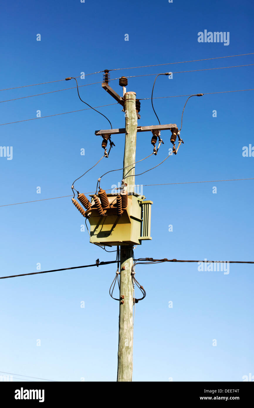 Power pole and rusty electrical power transformer, Dongara Western Australia Stock Photo