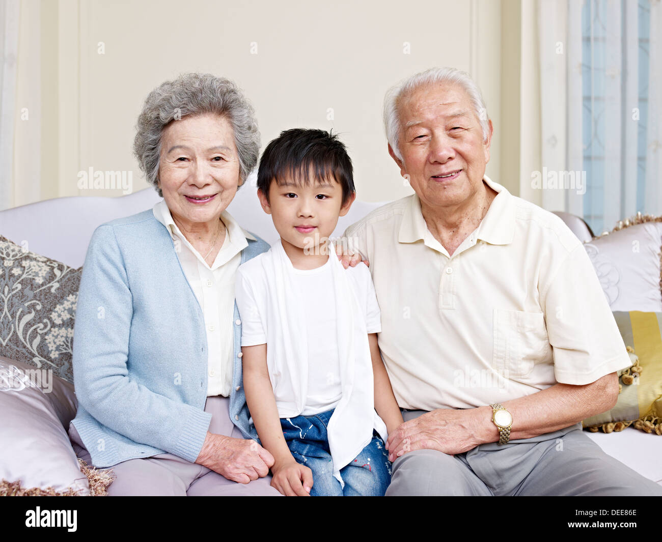 Grandparents And Grandson Stock Photo