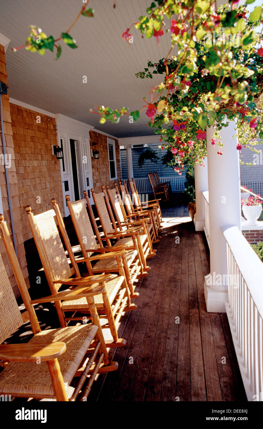 Rocking chairs on front porch of a Bed & Breakfast on Cape Cod, MA, USA