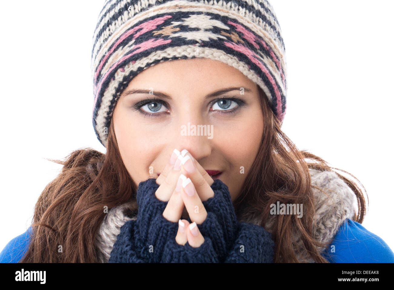 Model Released. Attractive Young Woman Wearing Woolly Hat and Gloves