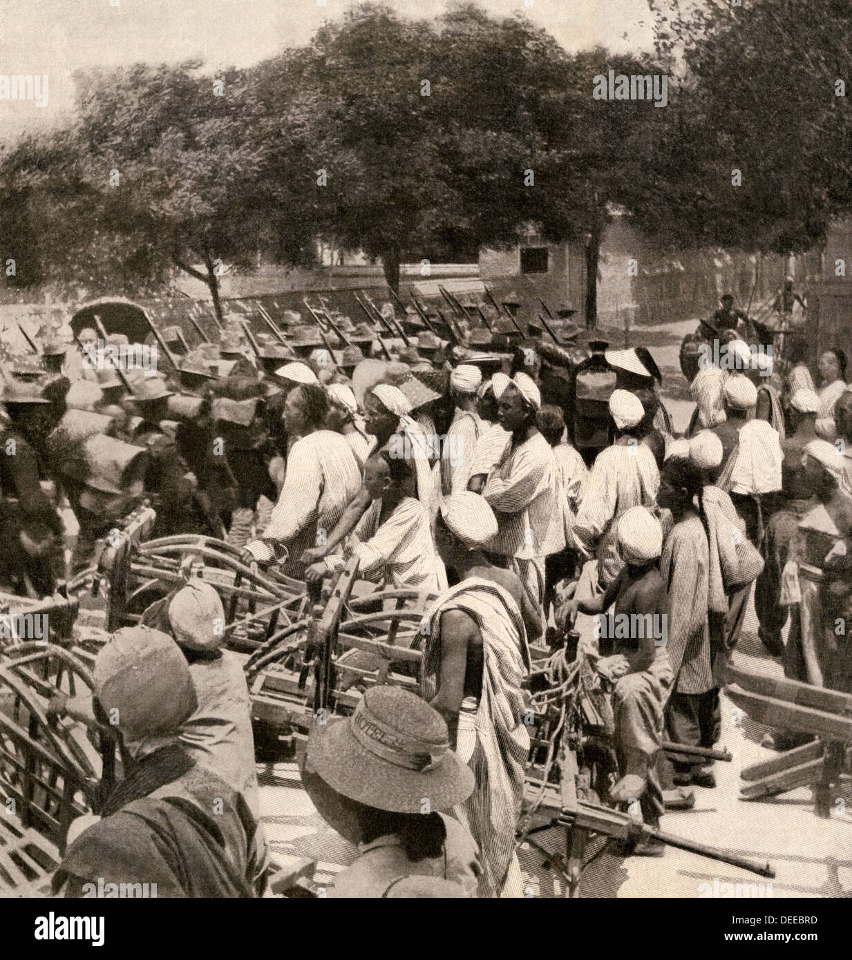 American Marines entering Tientsin, China, during the Boxer Rebellion, 1900. Halftone reproduction of a photograph Stock Photo