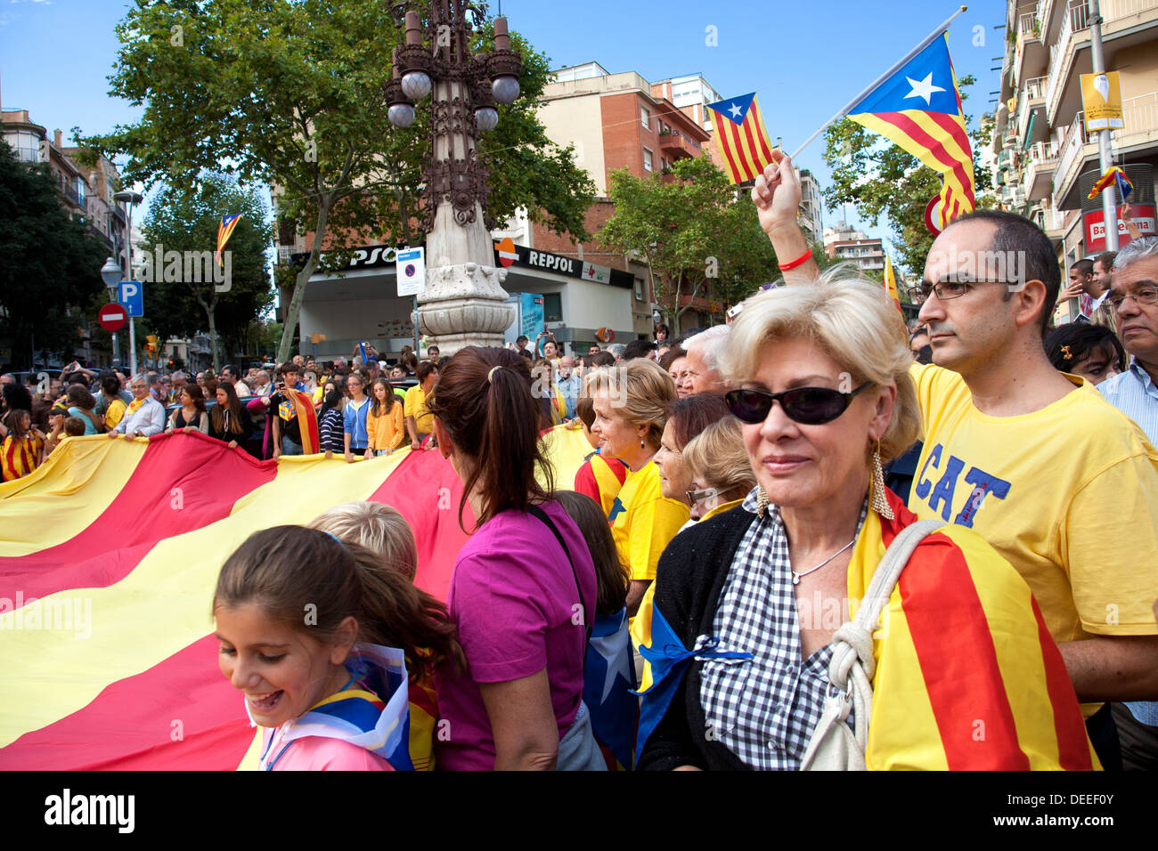 Catalans waving Catalan Independence flags on National Catalonia day, Barcelona, Spain. Stock Photo