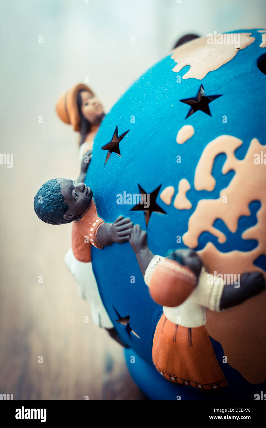 Care globe figurine hi-res stock photography and images - Alamy