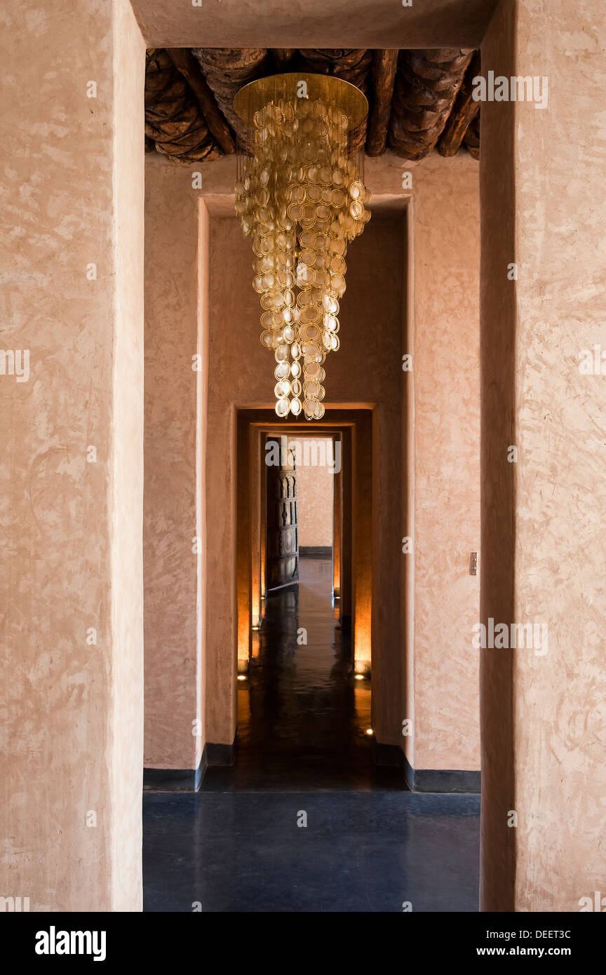 Golden light fitting in Moroccan new-build with interior design Romain Michel-Meniere Stock Photo
