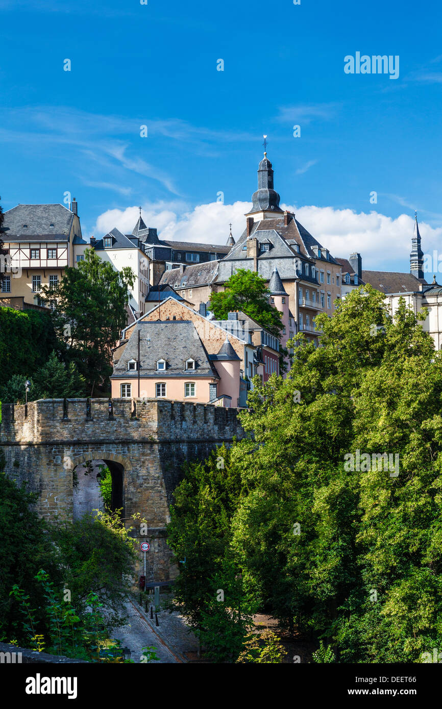 View towards the medieval Ville Haute from the Ville Basse or Grund district of Luxembourg City. Stock Photo