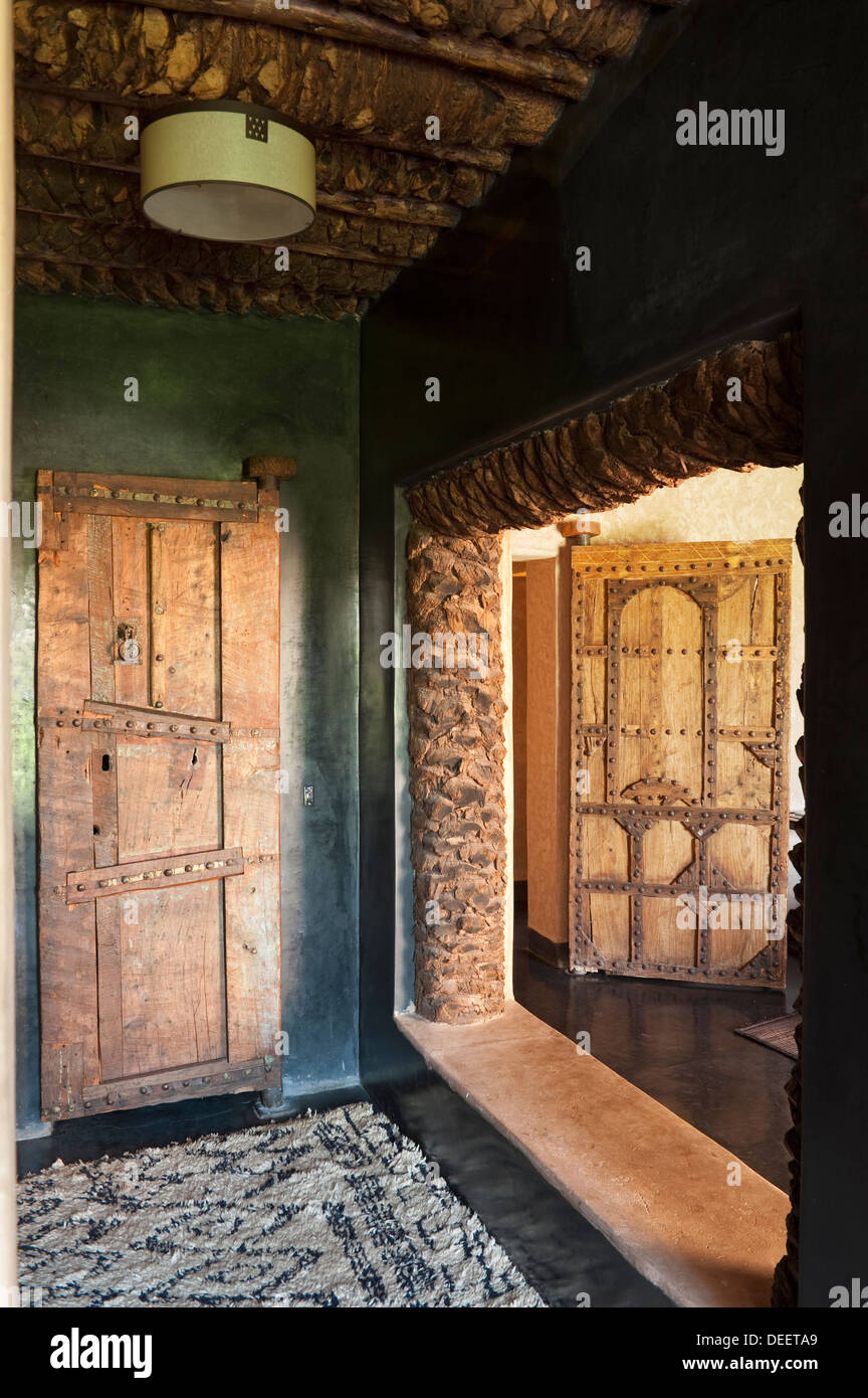 Carved Wood And Rivet Doors In Moroccan New Build With