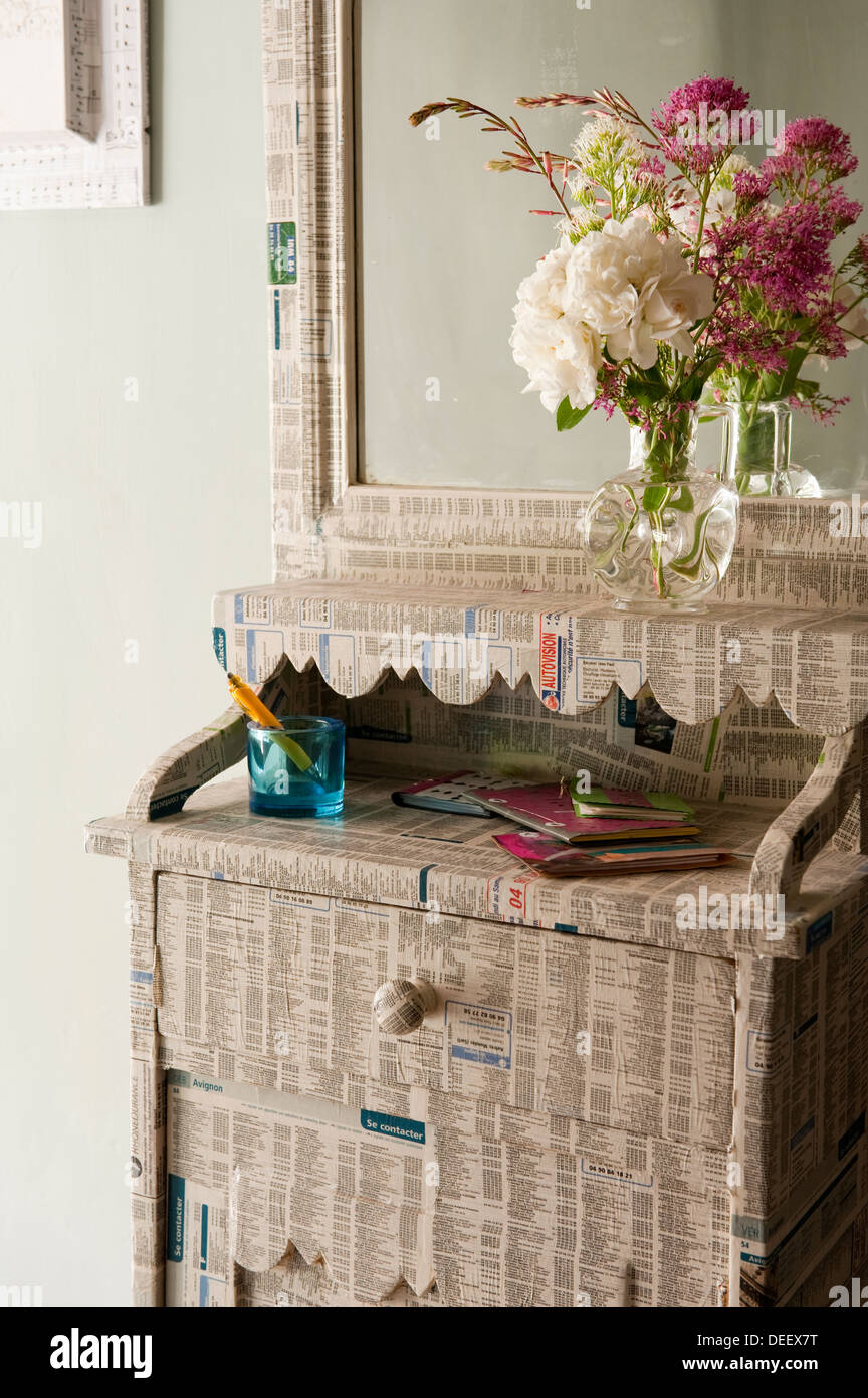 old-pine-cupboard-transformed-with-an-old-telephone-directory-in