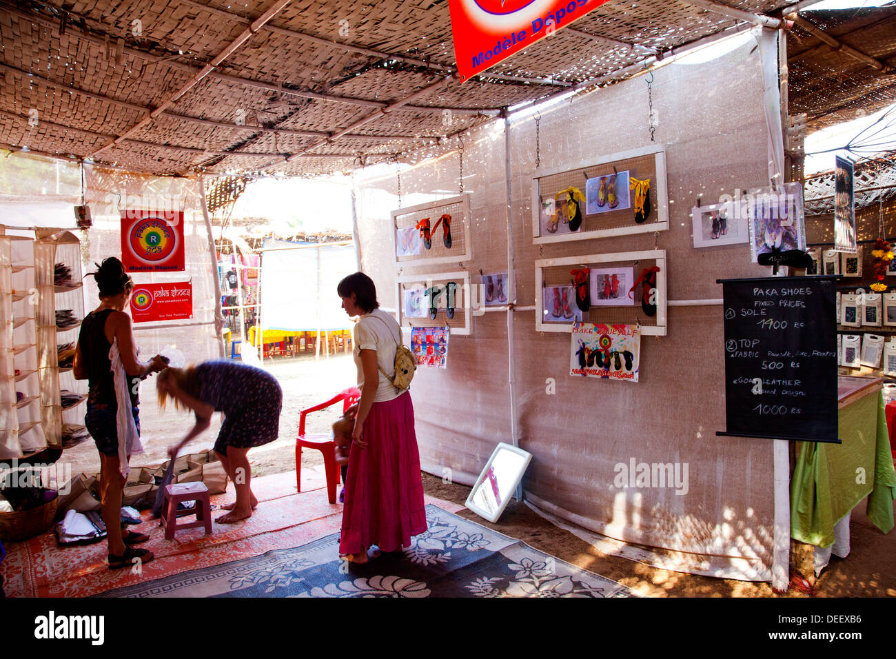Customers at a footwear shop, Anjuna Beach Flea Market, Anjuna Beach