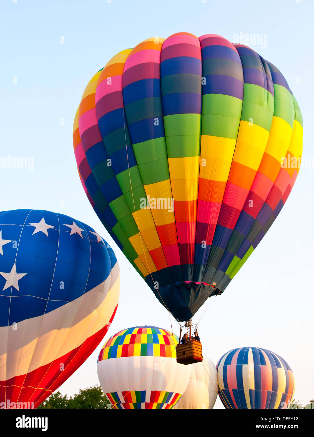 Colorful hot air balloons taking off during the Spirit of Boise Balloon