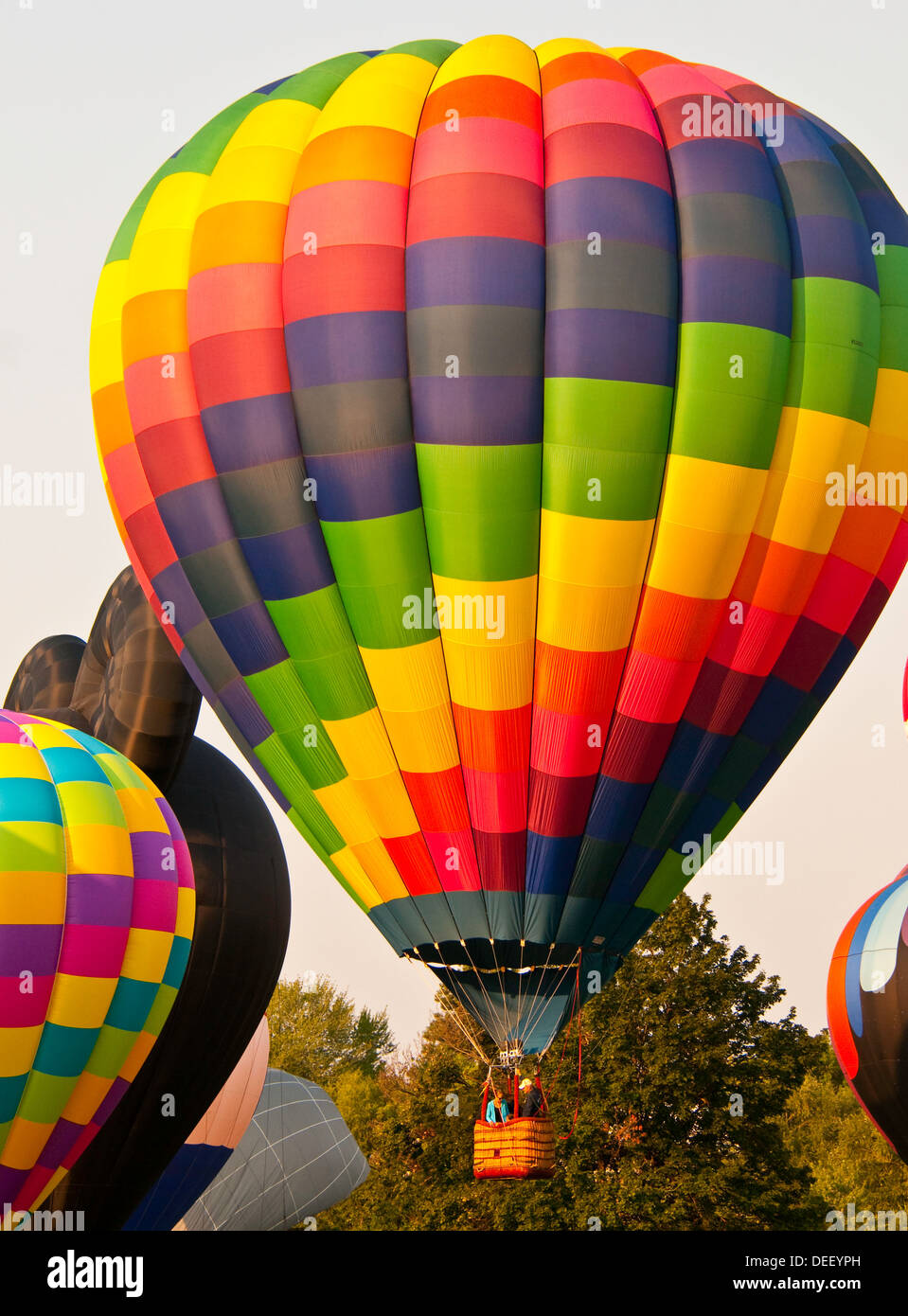 Colorful hot air balloons taking off during the Spirit of Boise Balloon