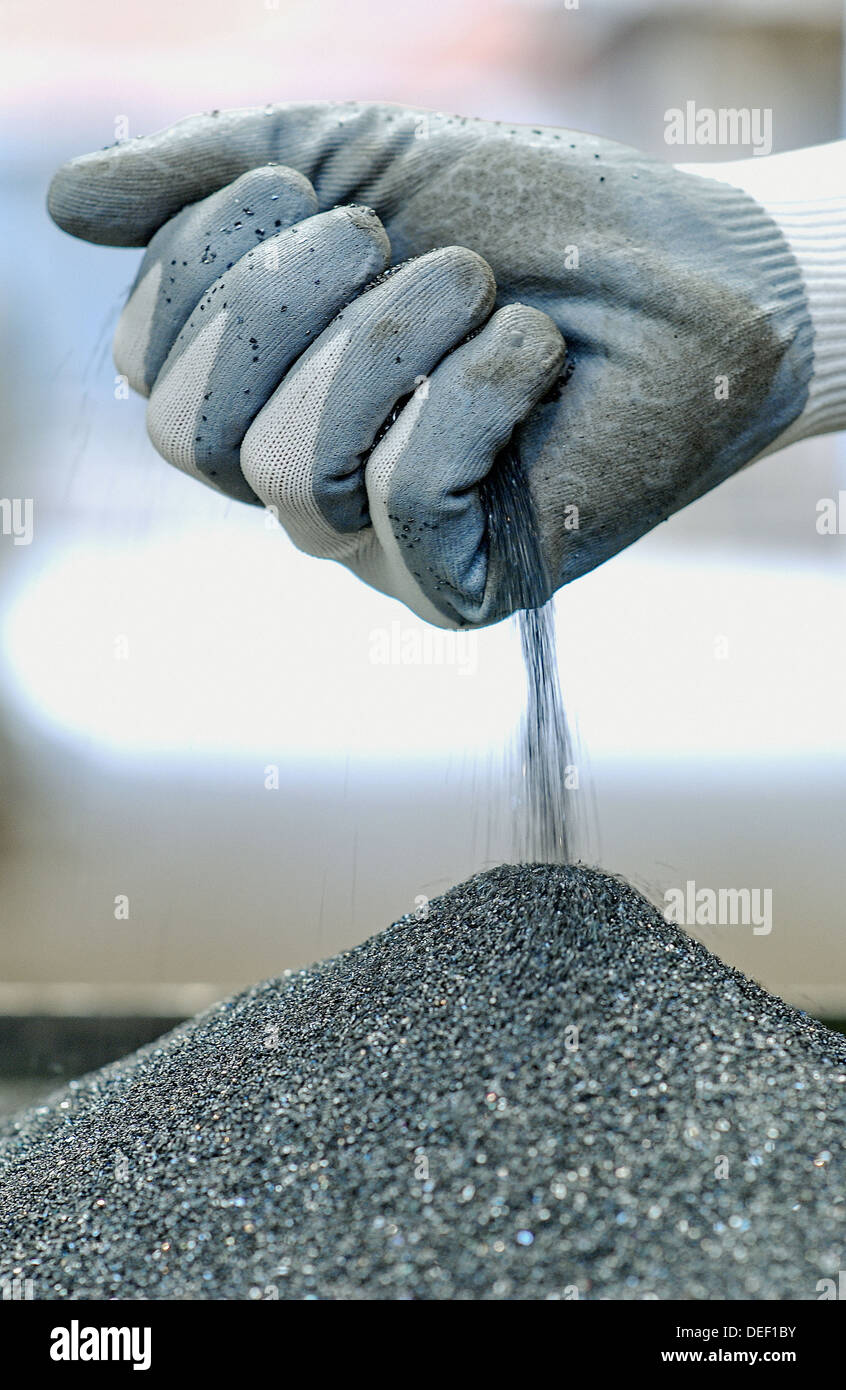 Control of abrasive powder for the fabrication of abrasive disks. Metal Industry. Stock Photo