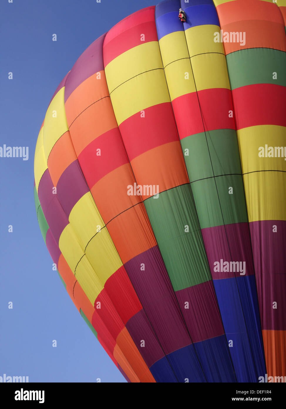 Multi-coloured fabric on hot air balloon Stock Photo