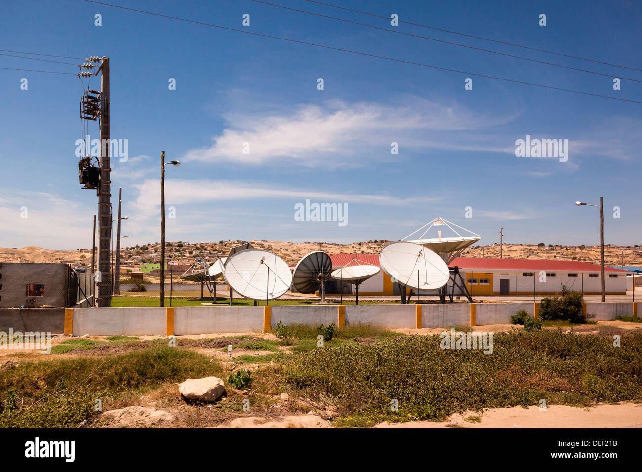 Africa, Angola, Lobito. Satellite dishes in gated area. Stock Photo
