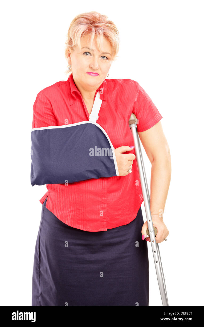 Injured mature woman with broken arm and crutch Stock Photo Alamy