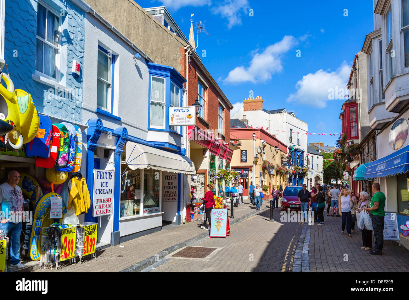 Shops on St George's Street in the town centre, Tenby, Pembrokeshire, Wales, UK Stock Photo