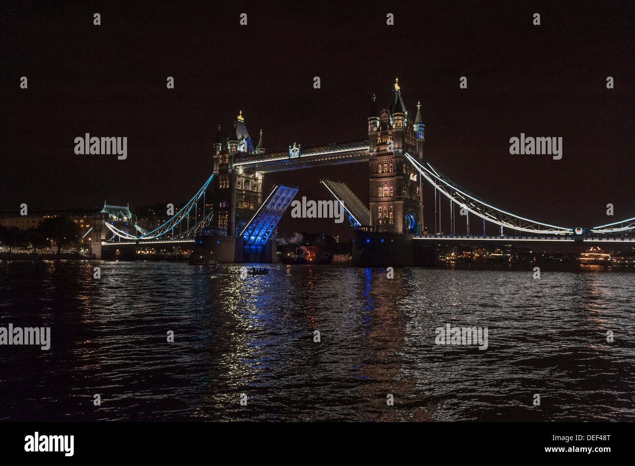 Tower Bridge Open At Night Stock Photo Alamy