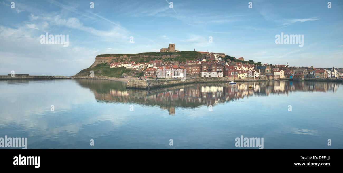 Whitby Harbor, from west side to east, with St Mary's church. Stock Photo