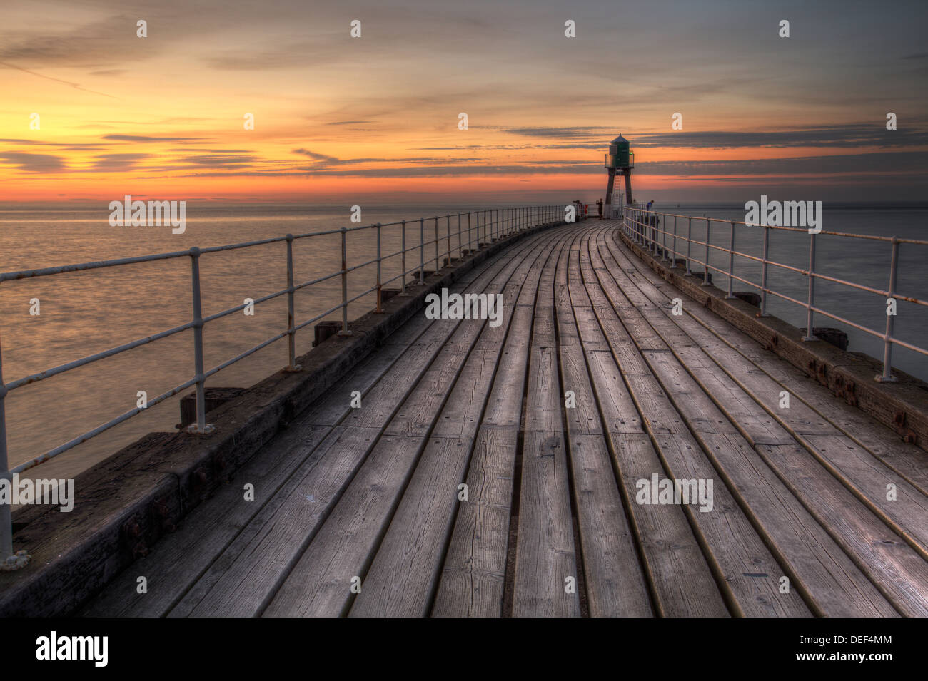 Whitby West Pier at Sunset Stock Photo