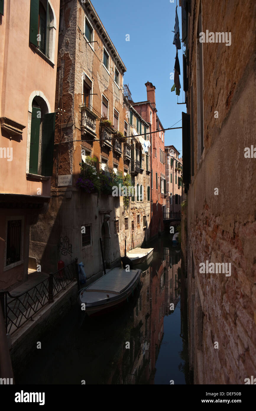 Private boats moored in a residential area of Venice, Italy Stock Photo