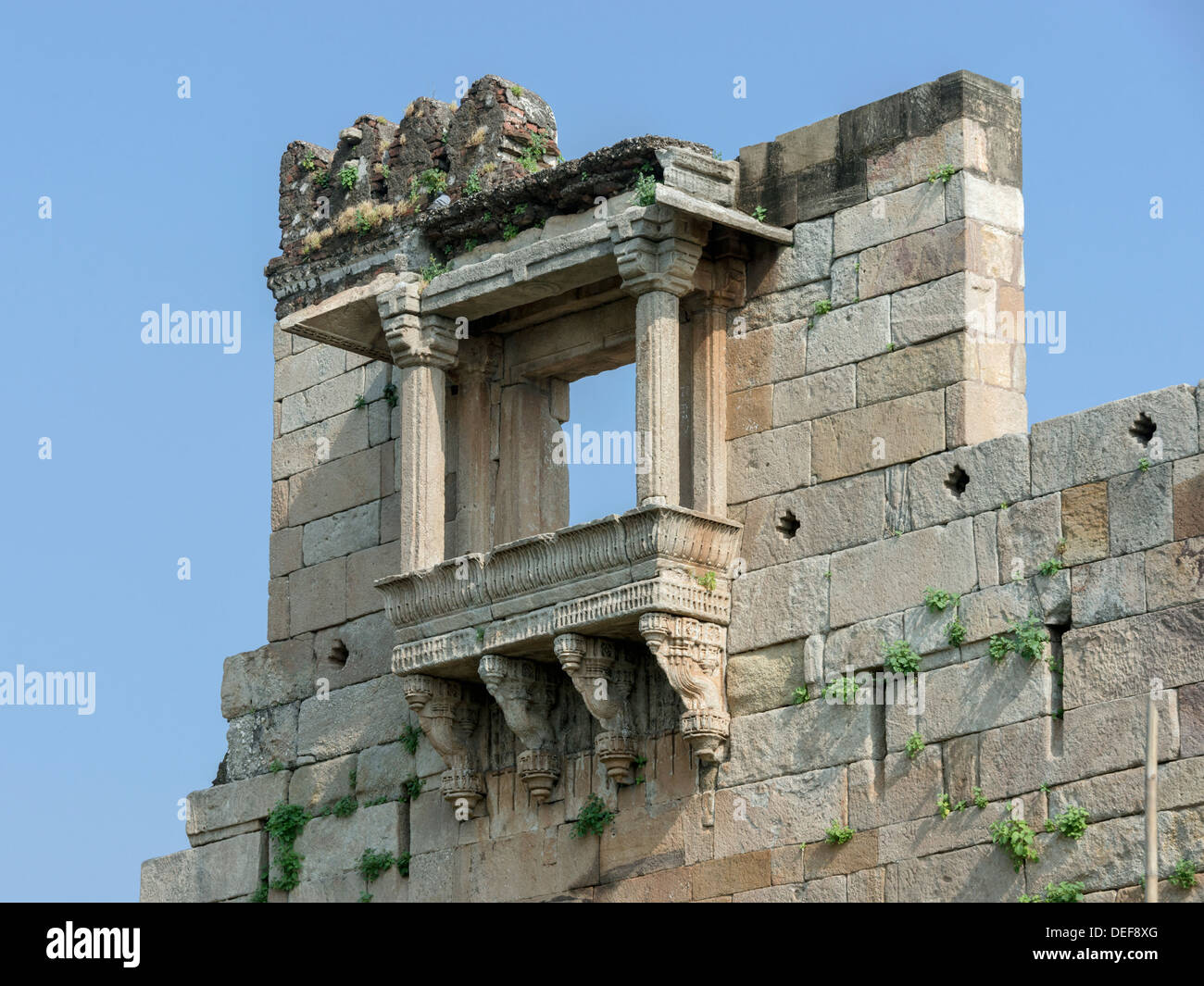 Angled view of jharokha (window/balcony) in the fortress wall at the Champaner Archaeological site, Gujurat State, India Stock Photo
