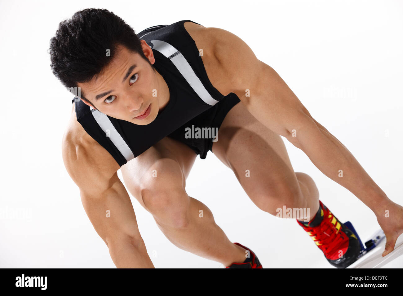 Runner in starting blocks hires stock photography and images Alamy