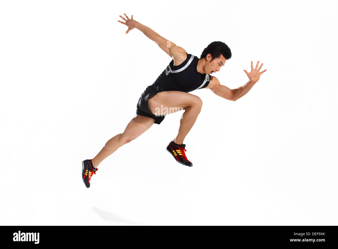 Runner in starting blocks hires stock photography and images Alamy