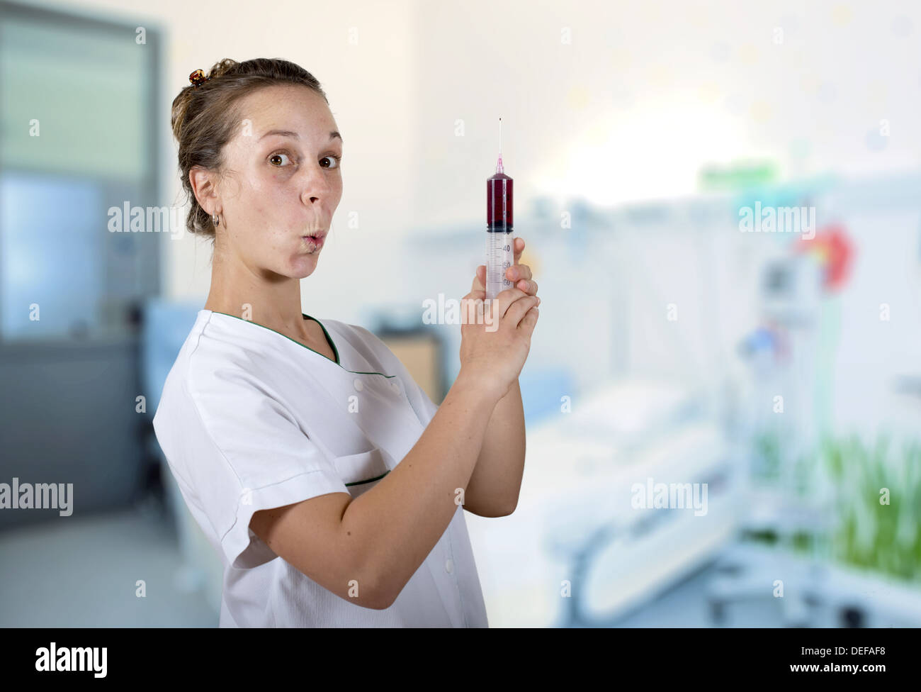 nurse and syringe Stock Photo Alamy
