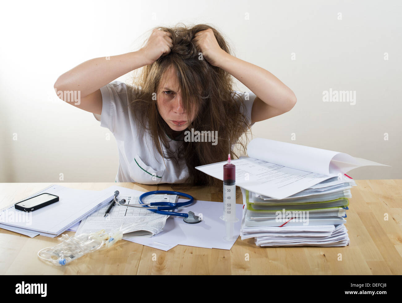 young female doctor angry Stock Photo - Alamy