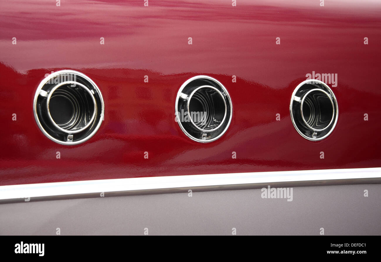 Old American car exhaust holes Stock Photo Alamy