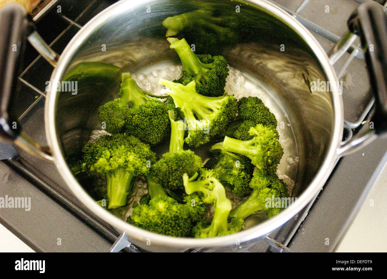 Steamed Broccoli In Pot On Stove Stock Photo Alamy,Contemporary Interior Design Characteristics
