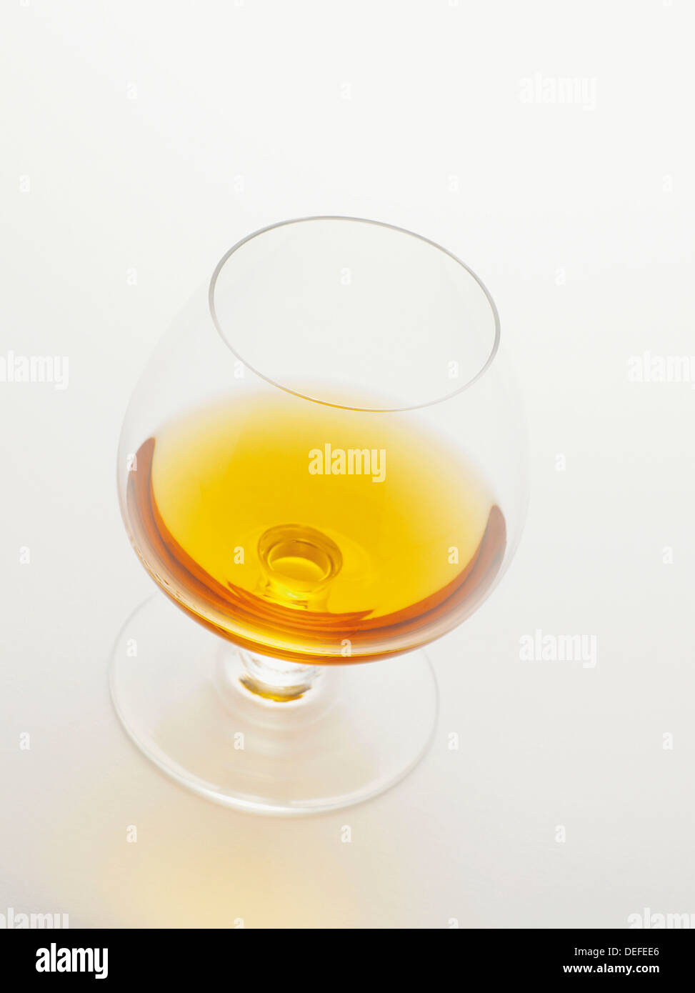 Cognac in a brandy snifter Stock Photo