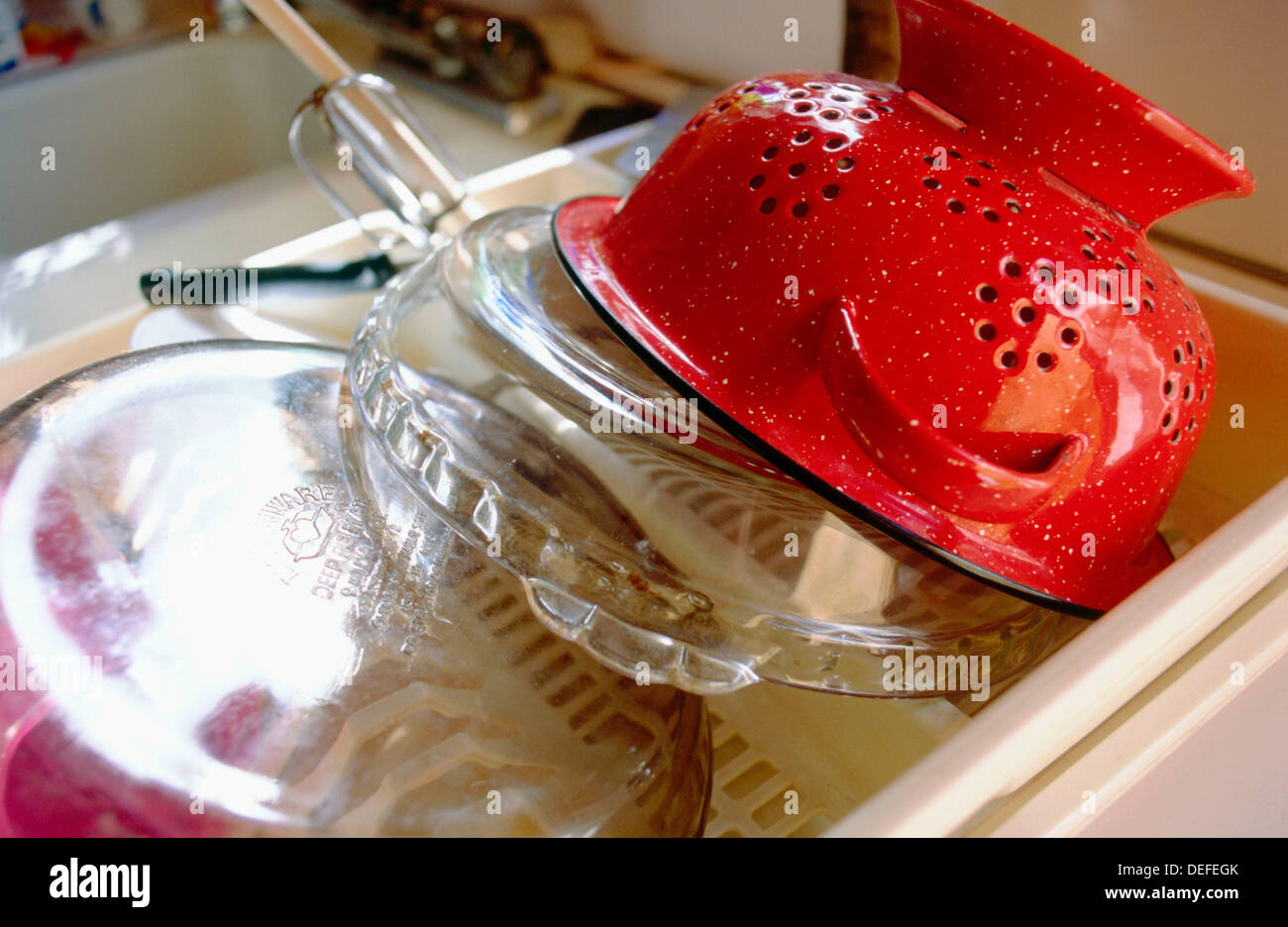 Dishes in a dishpan Stock Photo Alamy