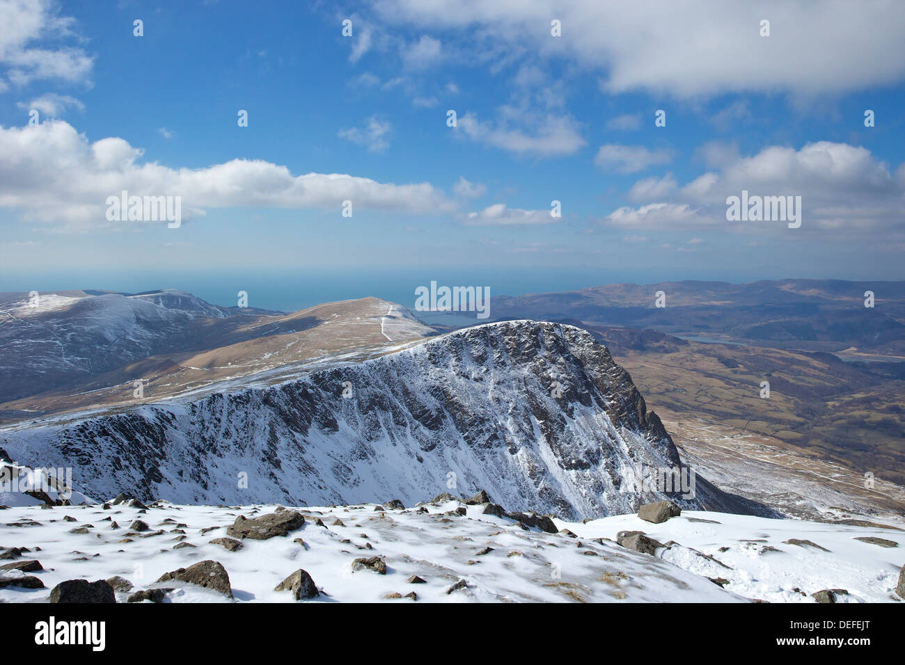 View from summit of Cader Idris in winter looking to Barmouth, Snowdonia National Park, Gwynedd, Wales, United Kingdom, Europe Stock Photo
