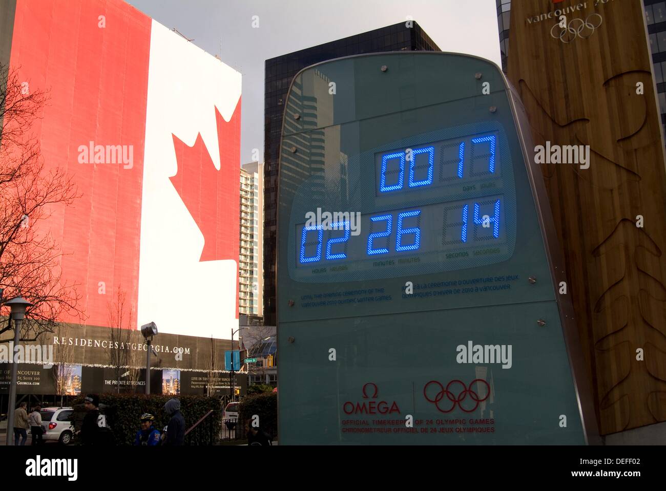 Olympic Clock At Georgia Plaza And Flag Of Canada On The - 