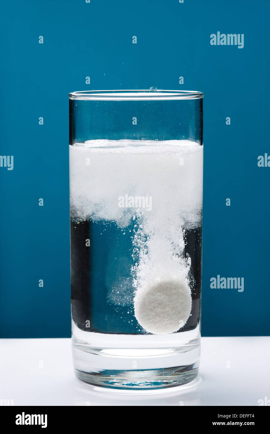 Fizzing tablet in glass of water Stock Photo Alamy