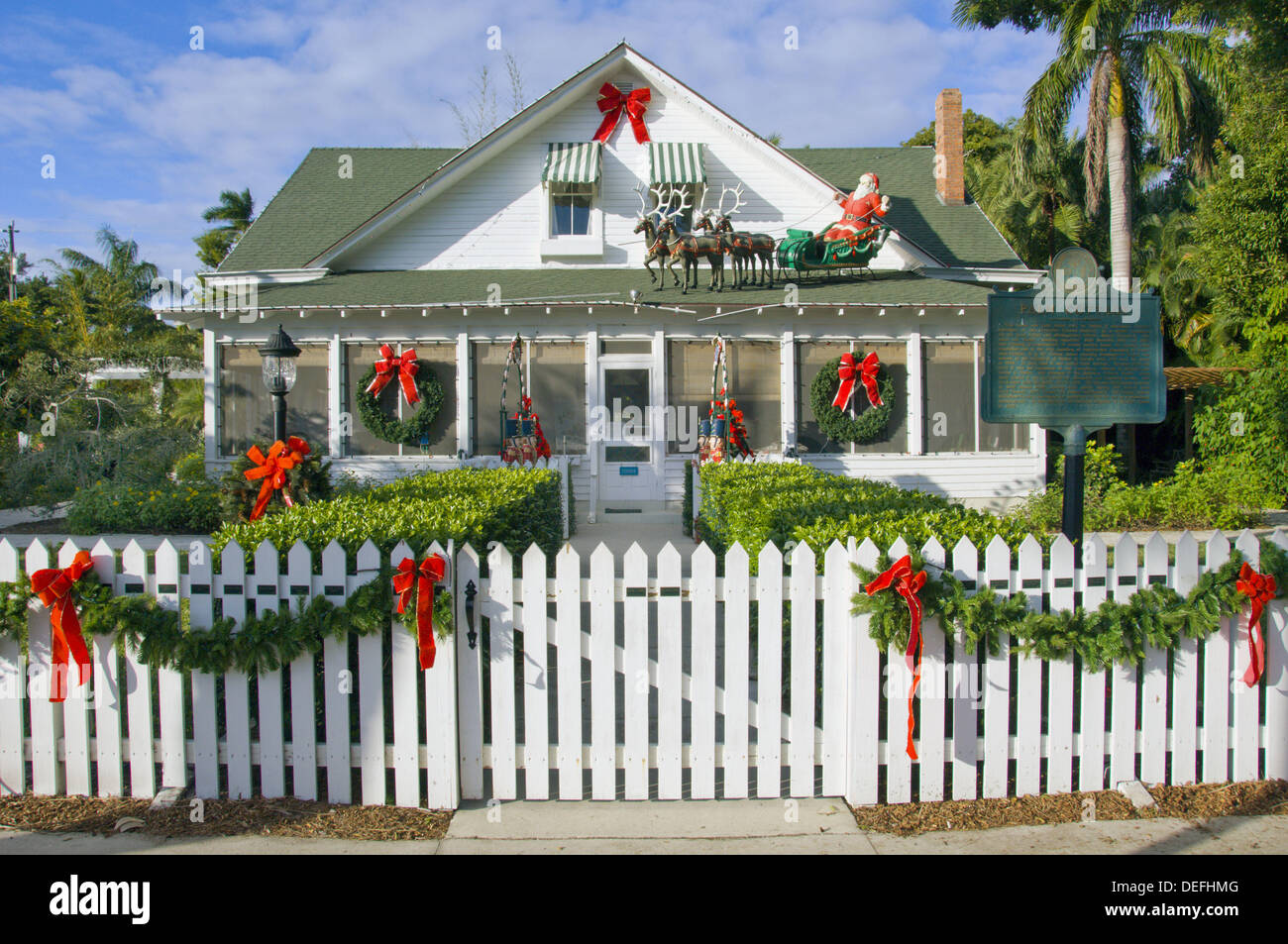The historic Palm Cottage decorated for Christmas in Naples, Florida