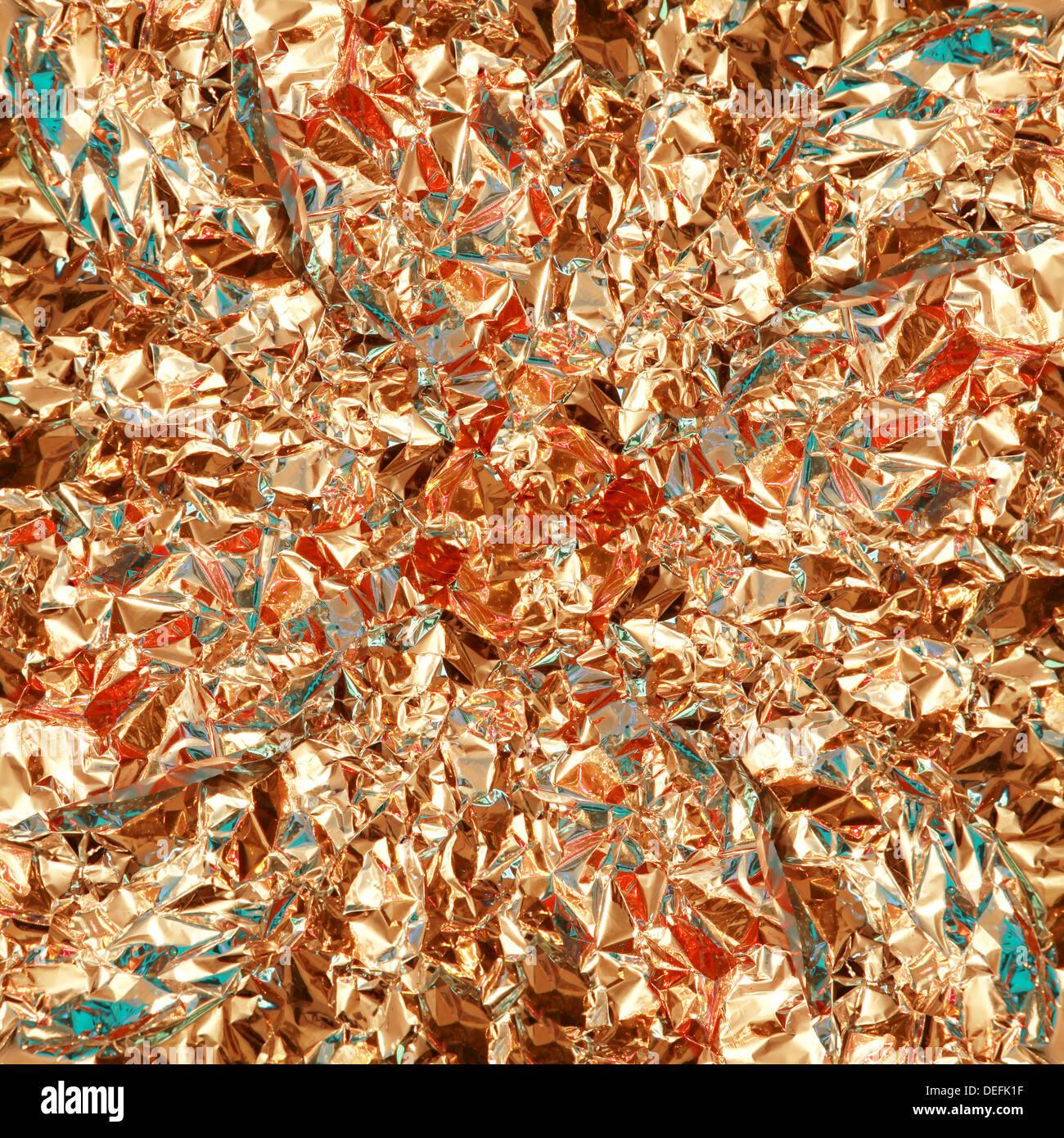 Shiny yellow leaf gold foil texture background Stock Photo