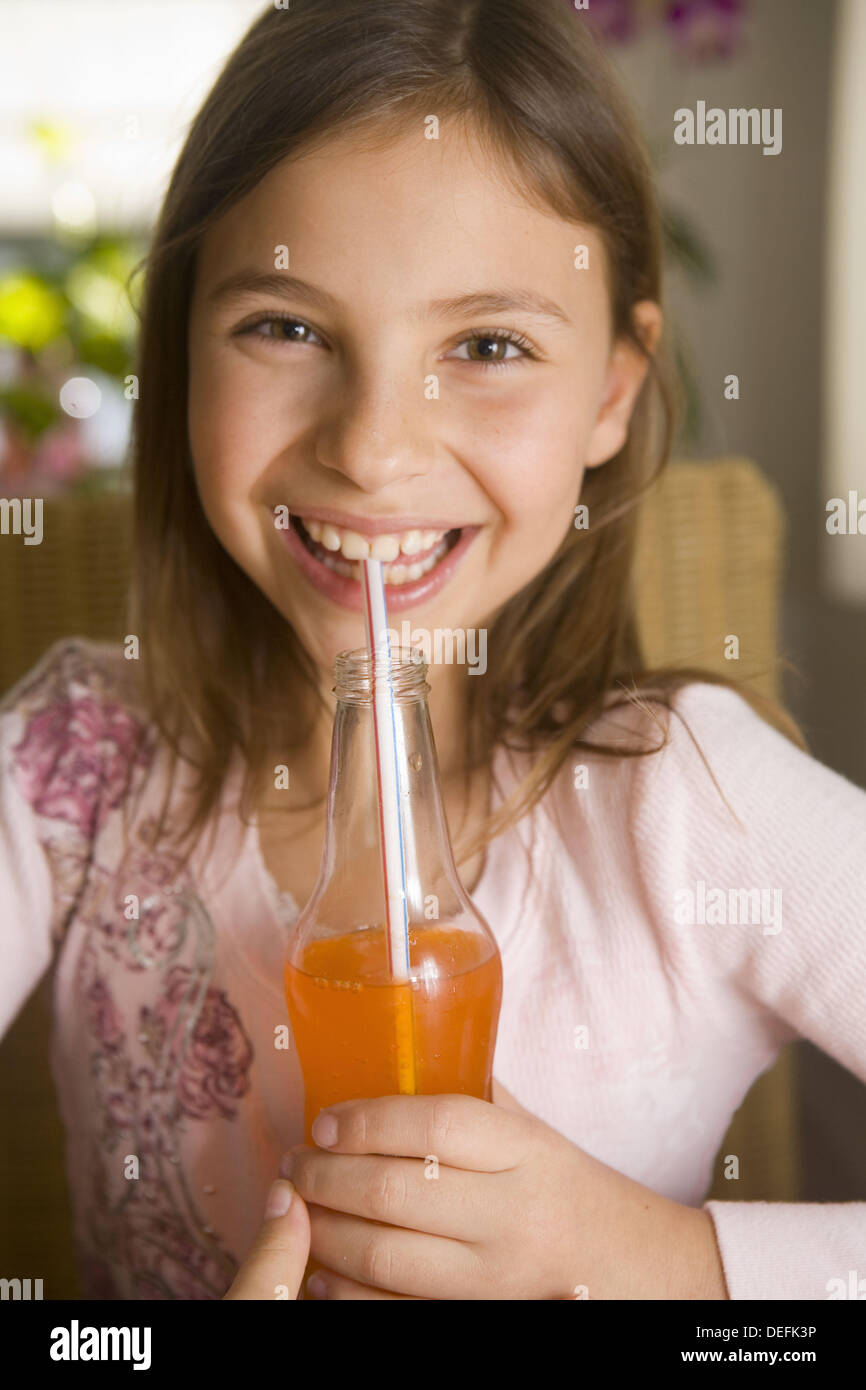 Girl drinking a soft drink Stock Photo Alamy